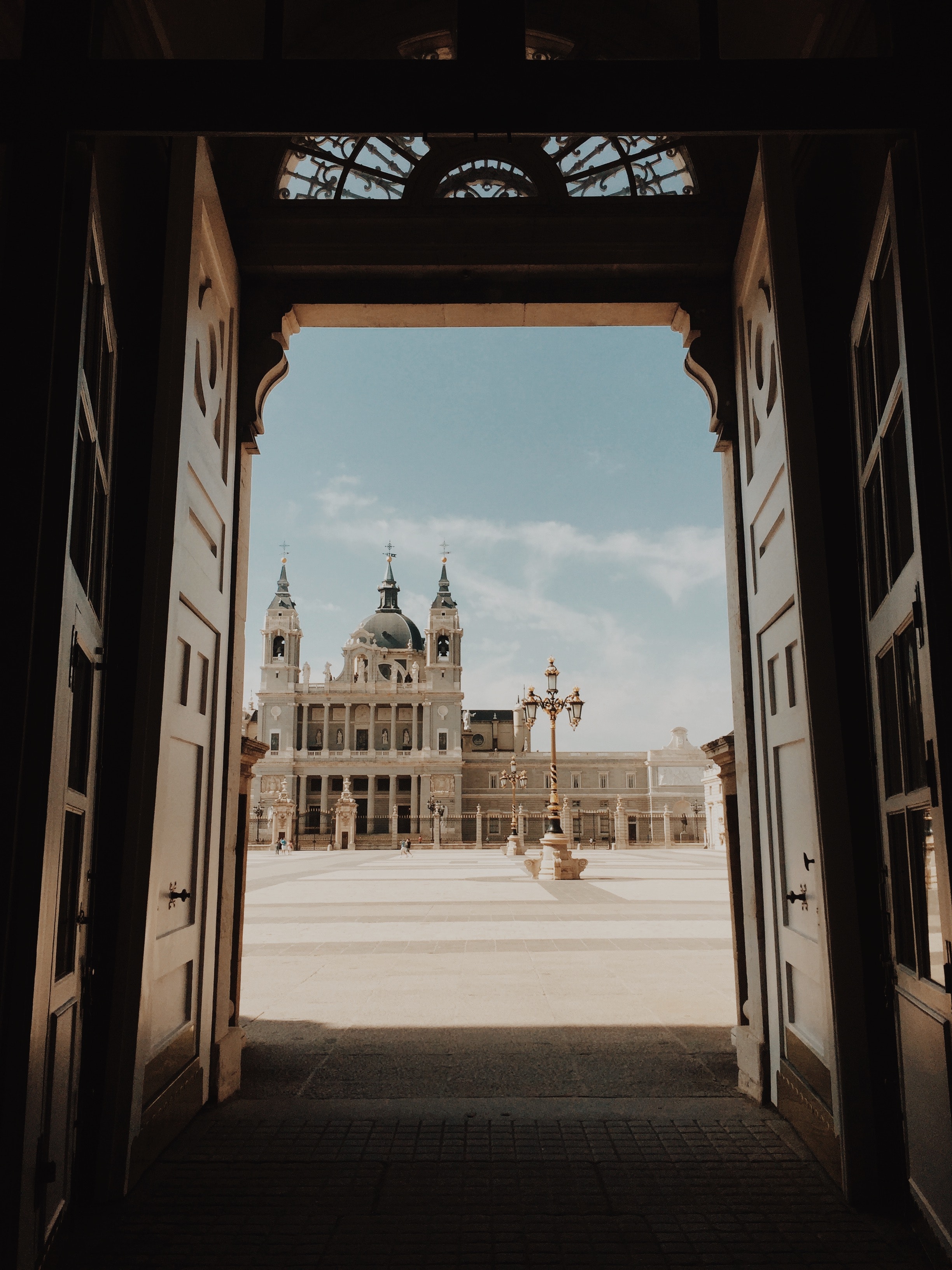opened-door-with-view-of-cathedral-2406875